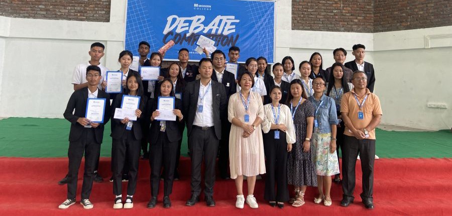 Participants of the debate competition held at Modern College.